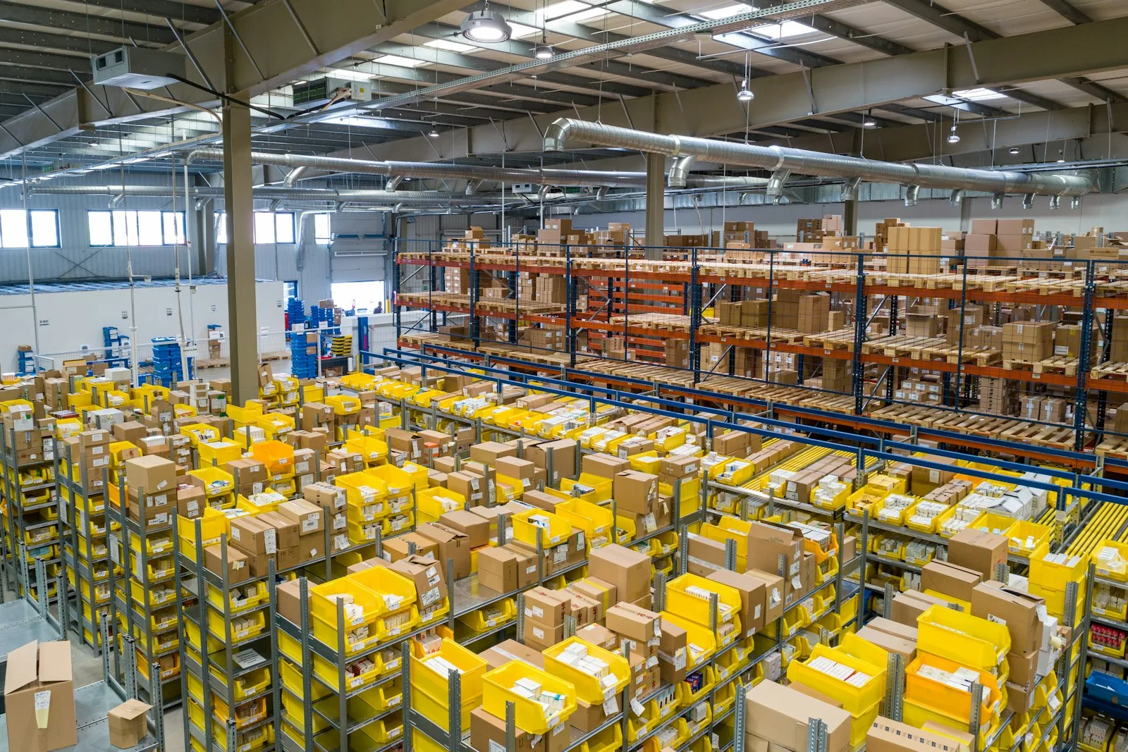 Distribution warehouse floor with racking and picking totes